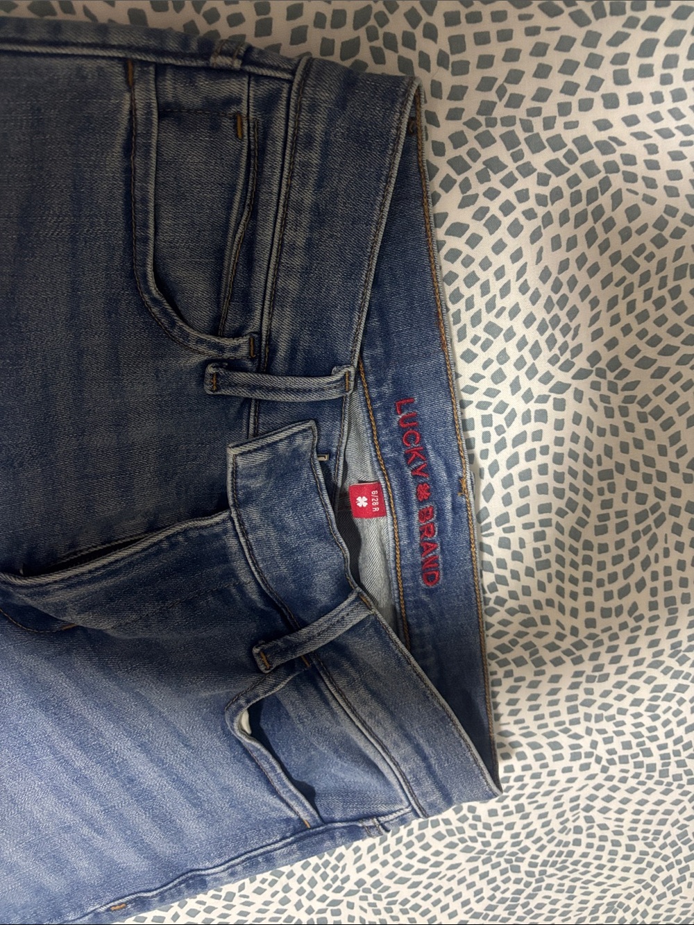 Lucky Brand flare Medium Blue Jeans with Red Logo Detail